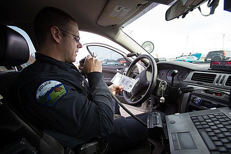 &lt;p&gt;Officer Daniel J. Duke radios into Post Falls dispatch after pulling over a truck going 44 miles per hour in a 35 mile per hour sped zone on Lancaster Road in Rathdrum on Friday morning. A recent report using 2012 FBI Uniform Crime Report data ranked Rathdrum as the seventh-safest city in the state with populations of 5,000 or more and first among cities north of Moscow.&lt;/p&gt;