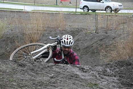 &lt;p&gt;Thomas Miller nears the crest of a hill during Sunday's cyclocross event at Riverstone Park. Miller was one of 108 competitors.&lt;/p&gt;