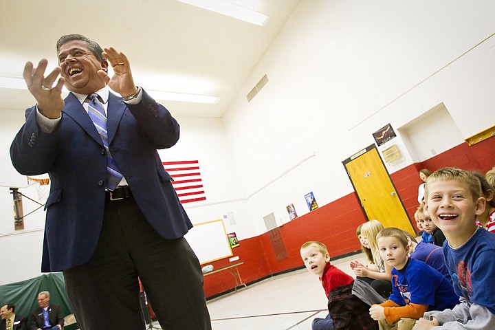 &lt;p&gt;SHAWN GUST/Press Tom Luna, superintendent of schools for the Idaho State Department of Education, and Kanyon Fitzsimmons, a first-grader at Winton Elementary, react to a student's humorous remarks Friday during a presentation at the Coeur d'Alene school. State education and government officials recognized the school with the 2009-2010 Additional Yearly Growth Award for a 10.38 percent increase in the school's Idaho Standards Achievement Test scores.&lt;/p&gt;