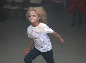 &lt;p&gt;Tyriah Morigeau gets into the Halloween spirit and shows off some of her zombie-moves at the Ronan Community Center.&lt;/p&gt;