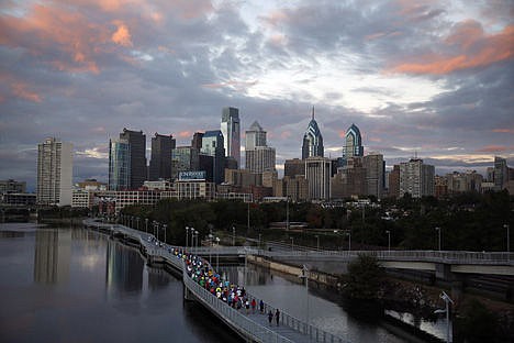 &lt;p&gt;Runners jog along the Schuylkill Banks Boardwalk, Oct. 1 in Philadelphia.&lt;/p&gt;