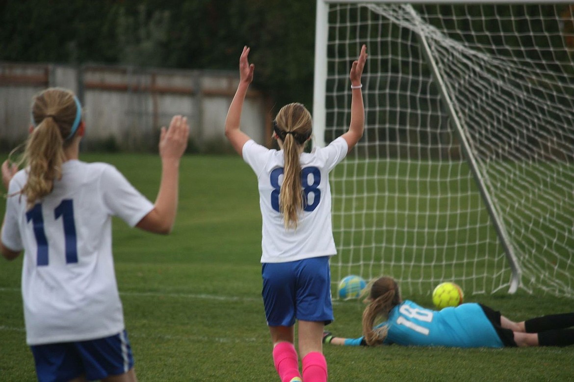 &lt;p&gt;Courtesy photo&lt;/p&gt;&lt;p&gt;Alaska Stone (88) and Ashlyn Deruyter (11) celebrate as Stone scores for the North Idaho Thunder 05 girls Hartzell.&lt;/p&gt;