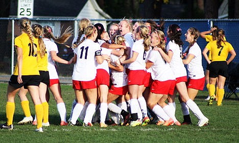 &lt;p&gt;The Bulldog girls celebrate their 1-0 win over Bishop Kelly in the 4A state championship game, defending their title.&#160;&lt;/p&gt;