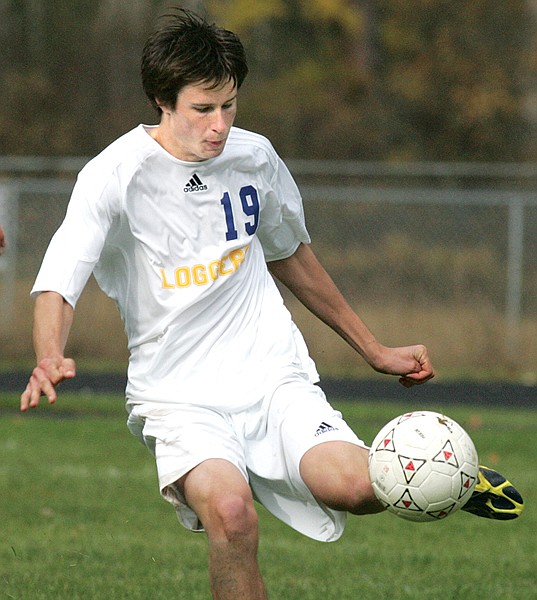 Libby's Caleb Lapka controls the ball in the semifinals vs. Livingston.