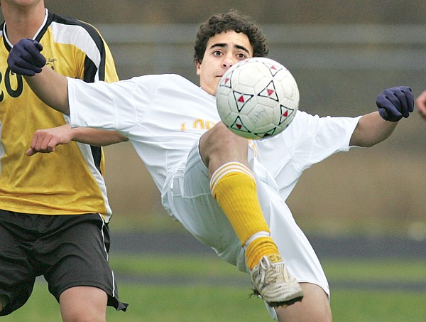 Libby's Recerdo Macaes controls the ball vs. Livingston.