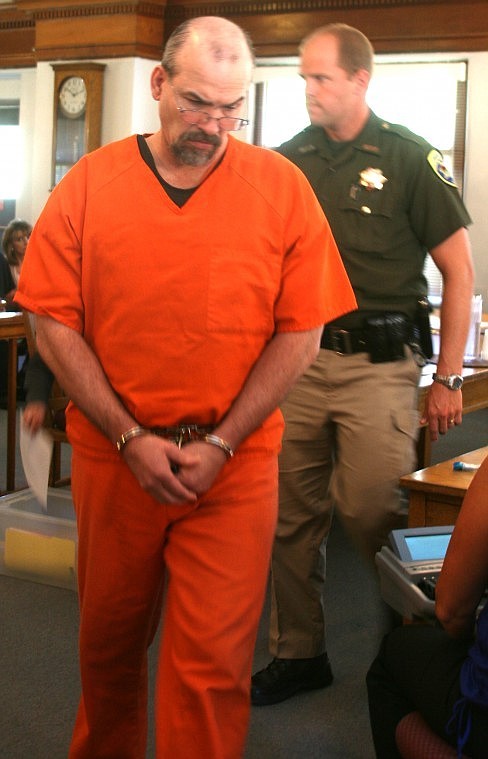 &lt;p&gt;Michael Woodard on Aug. 24 during his initial appearance in
District Court.&#160;&lt;/p&gt;