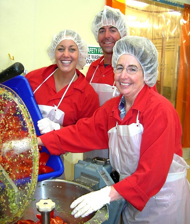 &lt;p&gt;From left to right, Bridget Ross, Jesse Briggs and Mary Ippisch
work together to make the homemade zucchini relish.&lt;/p&gt;