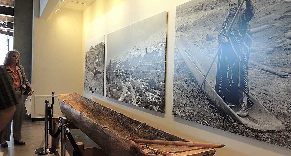 State Rep. Judy Warnick of Moses Lake views the first exhibit with seriousness after walking into the Wanapum Heritage Center.