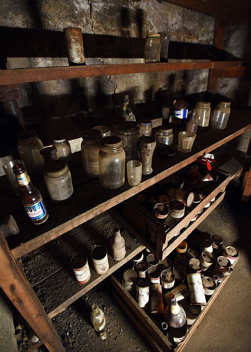 &lt;p&gt;A collection of old jars, bottles and bear cans are covered in a thick layer of dust in a back room in the basement of the Remington Bar in Whitefish on Monday, Oct. 24.&lt;/p&gt;