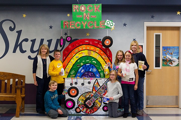 &lt;p&gt;SHAWN GUST/Press Skyway Elementary School third, fourth and fifth-graders participated in the construction of an art project to promote recycle of hard-to-recycle products as part of a national contest sponsored by www.terracycle.com. The final design, a box called &quot;Rock-n-Recycle,&quot; was made from candy and potato chip bags, juice pouches, drink straws, container lids and various other item that had a previous use. The box is one of ten finals that could win up to $1,000 in the 2012 Box that Rock contest. From left, Skyway art teacher Gerri Paradee, Chase Fredrickson, Connor Dremann, Ashton Sutton, Nicole Cicero, Mikayla Tihonovich and and Sheri Butler, volunteer parent and recycling expert.&lt;/p&gt;