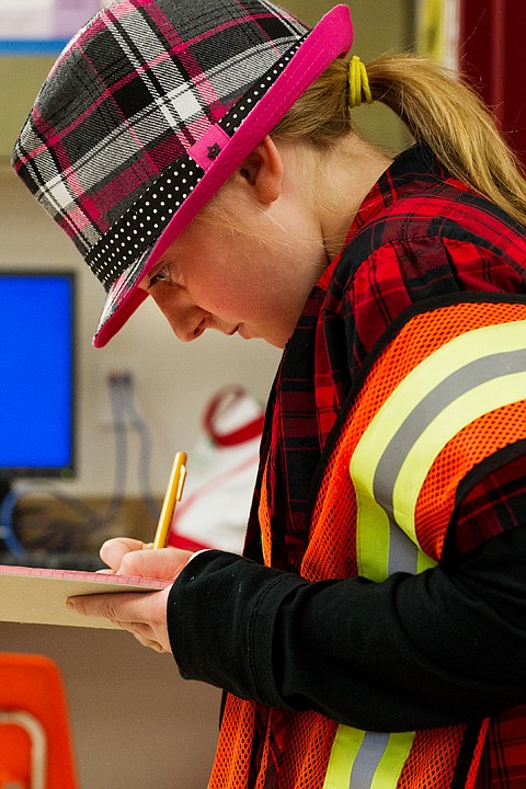 &lt;p&gt;SHAWN GUST/Press Fifth-grade student at Ramsey Magnet School Chase Crites takes notes while observing a class Friday as she serves the school as Principal for the Day. Crites earned the privilege by raising the most money in the school's jog-a-thin last month. As principal, she declared Friday both Hat Day and Red Shirt Day.&lt;/p&gt;