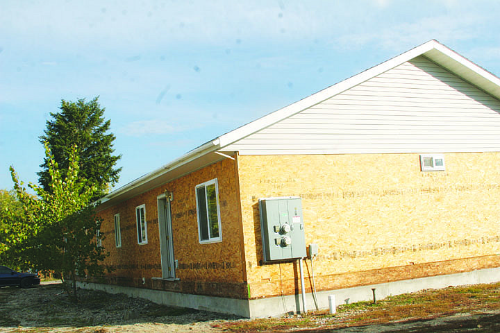 Work continues on the exterior of one of the duplexes. This building, after being abandoned for six months, will be completely restored.