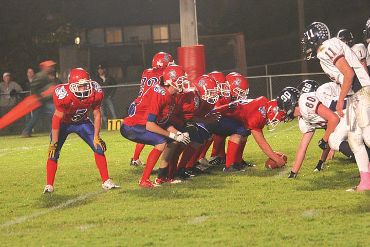 The Bobcats prepare to run a play during the game against Loyola on Friday night.