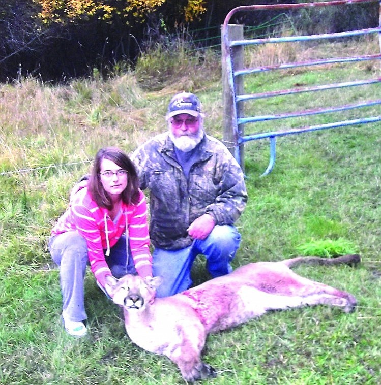 &lt;p&gt;Barbara Steward and Jim Moellman pose with a mountain lion
Moellman shot Saturday after the animal kept coming onto the
Steward's porch.&lt;/p&gt;