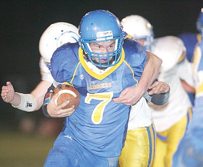 &lt;p&gt;Junior quarterback Braydan Thom to the Bluehawk 10-yard line for a first down fourth quarter vs. Thompson Falls Oct. 23.&lt;/p&gt;