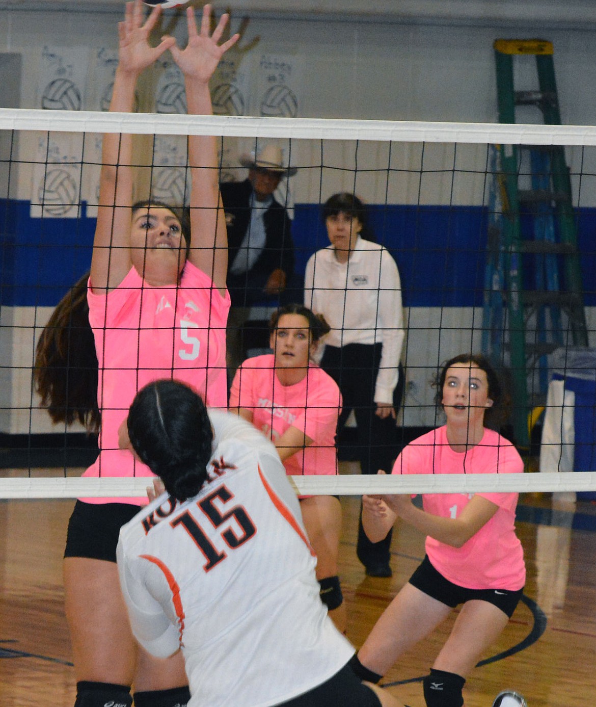 &lt;p&gt;MISSION VOLLEYBALL player Arianna Rossi attempts to block Alicia Camel's kill attempt in a regular-season match Thursday night at Mission High School.&lt;/p&gt;