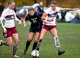NIC ROUNDUP: Cardinal women tripped up by mud, Spokane