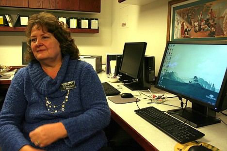 &lt;p&gt;Connie Godak, director of the Hayden Lake Family History Center sits in the center's computer lab, where visitors can research family history online for free. The history center offers myriad resources for investigating family history.&lt;/p&gt;