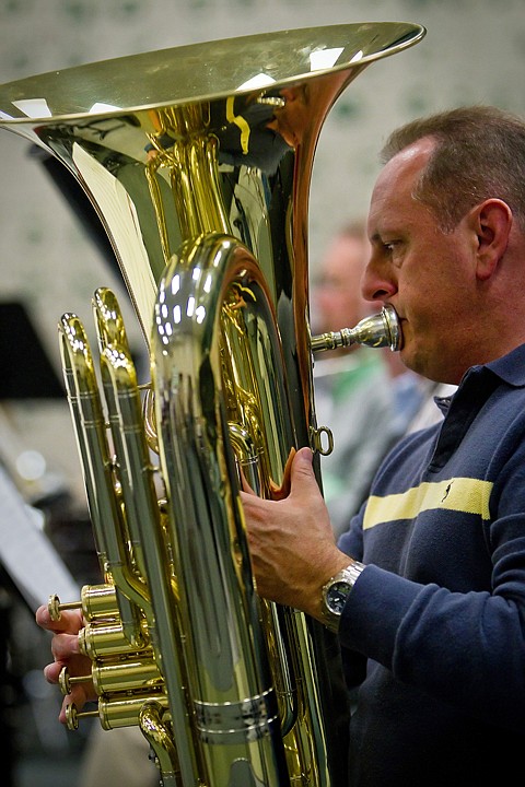 &lt;p&gt;Eric Haakenson balances his tuba while providing the low-end sound from the brass section during a rehearsal Tuesday with the Panhandle Symphony Orchestra.&lt;/p&gt;