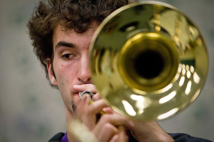 &lt;p&gt;AJ Sheffield reads his sheet music while playing the trombone.&lt;/p&gt;