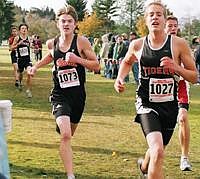 Plains runner Carter Montgomery runs hard across the finish line at the state meet in Missoula earning him all-state status.