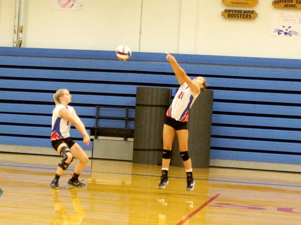<p><strong>Emma Duboise and Mackenzie Mueller bump the ball to prepare another volley during Superior’s game against Alberton.</strong></p><div><strong> </strong></div>