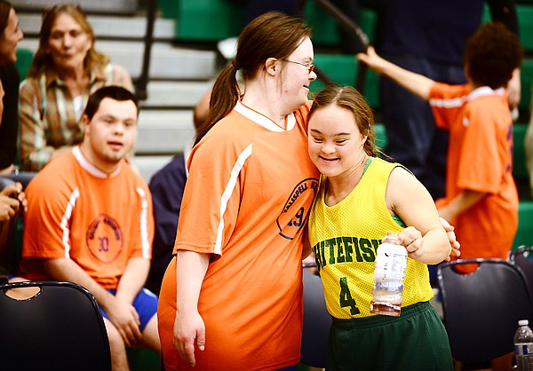 &lt;p&gt;Jenni King of the Kalispell Krushers, left, gets a hug from Cedar Vance of Whitefish between games at the Special Olympics Montana Glacier Area Basketball Tournament on Friday, October 25, in Kalispell. (Brenda Ahearn/Daily Inter Lake)&lt;/p&gt;