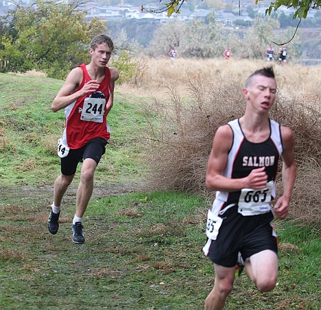 &lt;p&gt;Coeur d'Alene Charter junior Leif Fredericks, back, gains ground on Salmon's Billy Godfrey during the first mile of the state cross country meet on Saturday at Hells Gate State Park in Lewiston. Fredericks finished third, helping Coeur d'Alene Charter to a fourth-place finish.&lt;/p&gt;