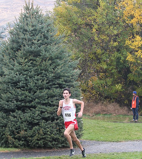 &lt;p&gt;Sandpoint's Sam Levora makes the final turn to the finish line in the boys 4A race at the state cross country meet Saturday at Hells Gate State Park. Levora finished second in 15:49.20.&lt;/p&gt;