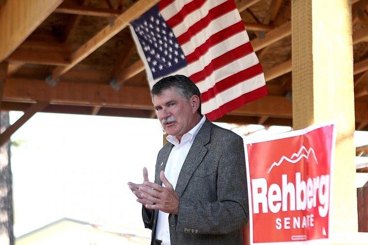 <p>File photo: Rehberg talks to folks in Superior in early September.</p>