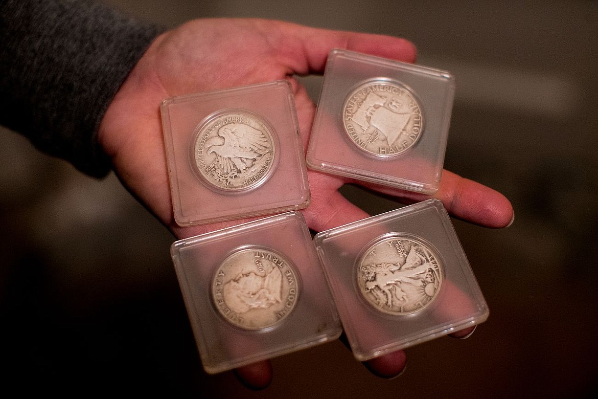 &lt;p&gt;Quesnell holds coins dating back to the 1940s that were found in the ceiling in the basement of her home, which was built in 1921.&lt;/p&gt;