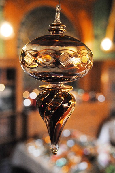 <p>Reproduction glass ornaments by Christopher Radko add vintage
flair to the decorations at the Conrad Mansion.</p>
