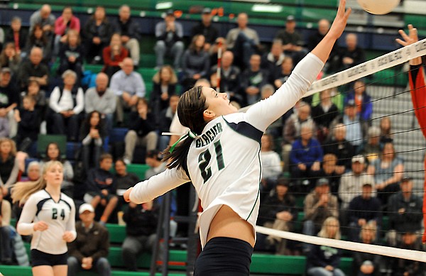 &lt;p&gt;Glacier senior Cassi Hashley (21) tips the ball over the net during the game against Missoula Hellgate on Tuesday, October 29, in Kalispell. (Brenda Ahearn/Daily Inter Lake)&lt;/p&gt;