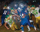 Cats crush Dogs for playoff berth