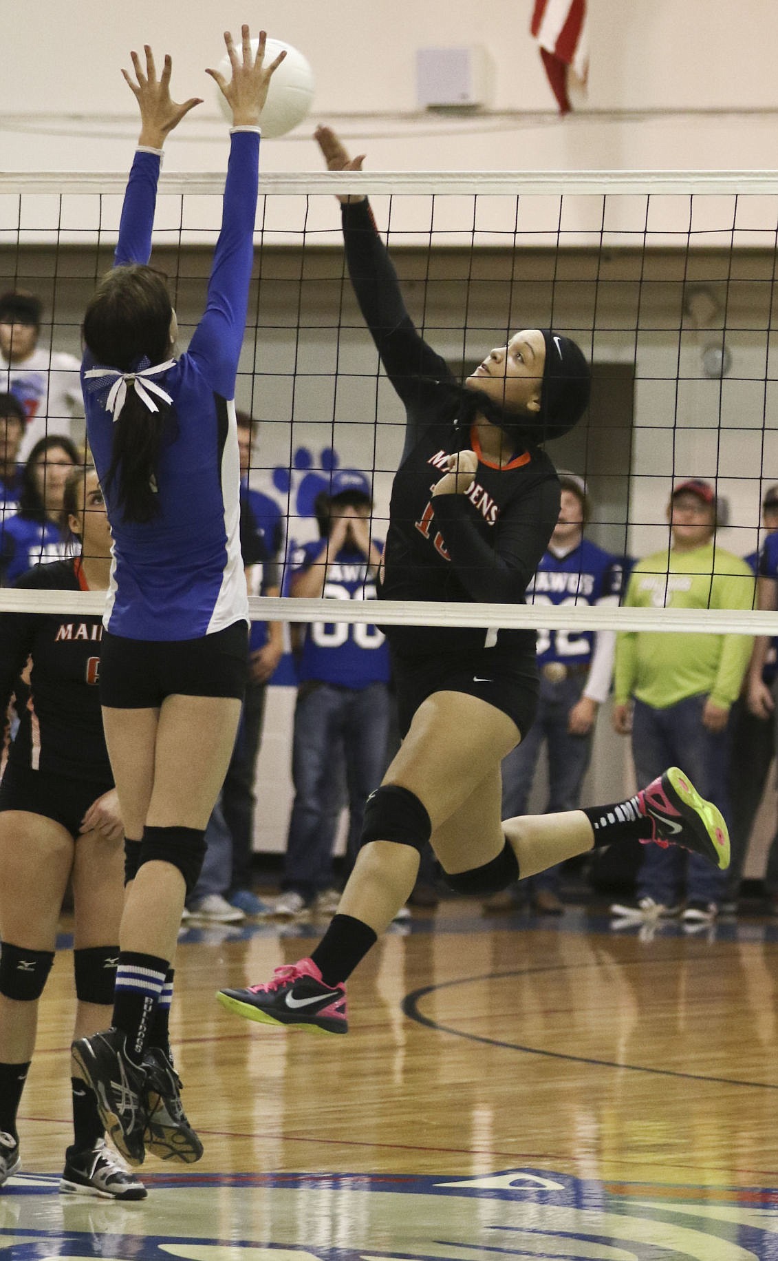 &lt;p&gt;Ronan's Alicia Camel spikes the ball during their game against Mission on Thursday.&lt;/p&gt;