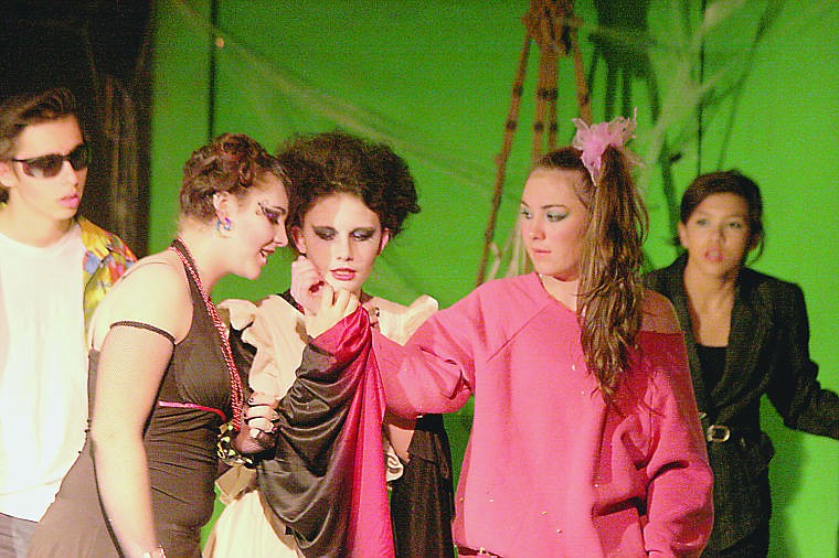 &lt;p&gt;Tierra Person as Scarlett Bytes and Hannah Knight as Elvira Bytes smell blood on Candy played by Tanna Cole during The Family Bytes drama performance put on my Plains High School.&lt;/p&gt;