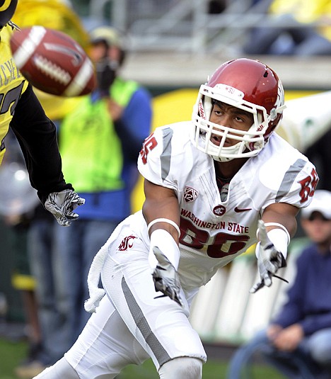 &lt;p&gt;Washington State's Marquess Wilson keeps his eyes on the ball during the first half Saturday at Eugene, Ore.&lt;/p&gt;