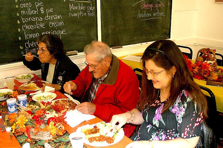 &lt;p&gt;Yolanda and Ernesto Ornelas and Bonnie Ford enjoy a spaghetti dinner and pie, supporting the Old DeBorgia Schoolhouse Friday.&lt;/p&gt;