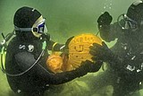 Divers host underwater pumpkin carving