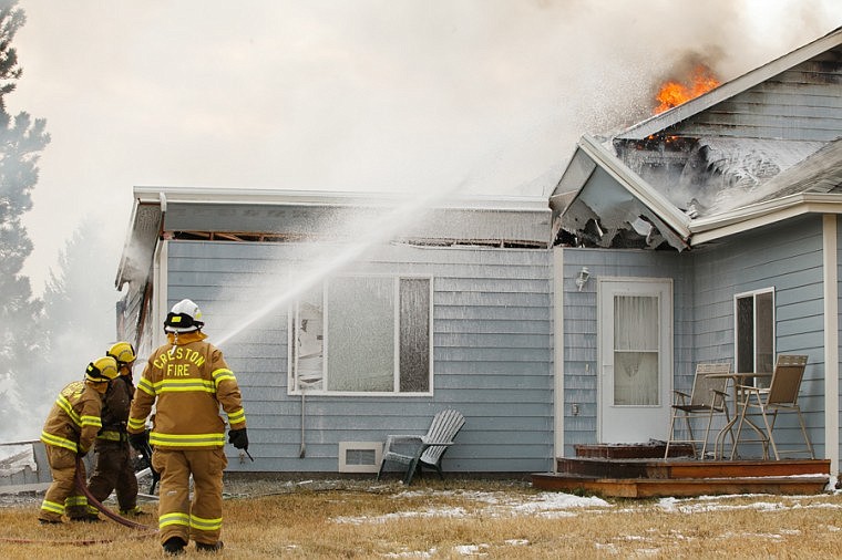 &lt;p&gt;Patrick Cote/Daily Inter Lake Bad Rock, Columbia Falls and Creston fire departments respond to a structure fire Thursday afternoon on Antler Bluff Lane off of Columbia Falls Stage Road. Thursday, Oct. 25, 2012 in Columbia Falls, Montana.&lt;/p&gt;