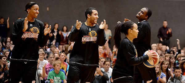 &lt;p&gt;From left, Selethia Jackson, Nick Simpson, Cherie Hughes, and Larry Pikes of the Harlem Ambassadors enter the Kalispell Middle School gym on Tuesday afternoon, October 23, for an assembly with the students. The Harlem Ambassadors have been around for 15 years. They have visited all 50 states as well as 23 countries. The players have each pledged to be drug free and they have all graduated from college. The players addressed topics like going above and beyond, personal responsibility, and perseverance as well as staying in school.&lt;/p&gt;