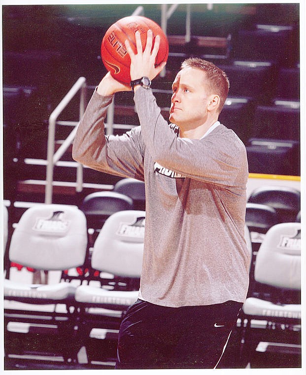 &lt;p&gt;Eric Stang takes a jump shot during warm-ups at Providence College, one of many stops in his journey through coaching.&lt;/p&gt;