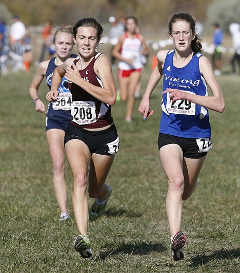 KATHERINE JONES/The Idaho Statesman
&lt;p&gt;Josie Brown, right, of Coeur d'Alene hangs tough on the home stretch to take third place in the state 5A cross country meet at Eagle Island State Park on Saturday. Brown beat out Rachel Sullivan from Centennial (208) and Jordan Mathes from Mountain View.&lt;/p&gt;