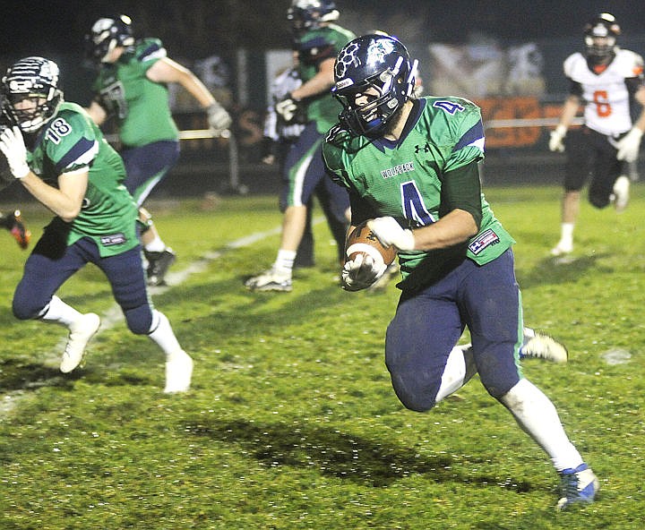 &lt;p&gt;Glacier running back Thomas Trefney turns the corner during a touchdown run in the second quarter of A crosstown football game with Flathead at Legends Stadium on Friday, Oct. 31, 2014. (Aaric Bryan/Daily Inter Lake)&lt;/p&gt;