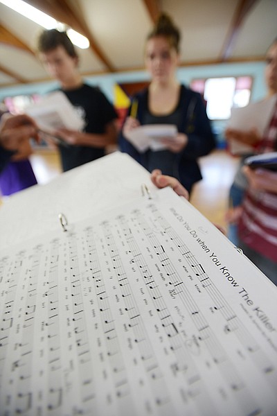 <p>Cast members of "Much Ado About Murder" work on the song "What Do You Do When You Know The Killer" Oct. 24 at the Bigfork Playhouse Children's Theatre Performing Arts Center.</p>