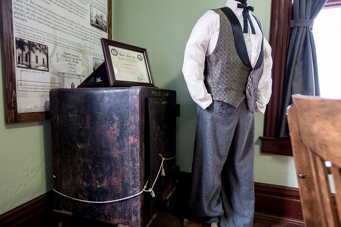 &lt;p&gt;A floor safe is positioned beside an original sheriff's uniform on Thursday at the Kootenai County Jail in Rathdrum. When Culver discovered that the steel door leading to the jail cells was mysteriously opened, she also found the safe opened, something out of the ordinary for the museum.&lt;/p&gt;