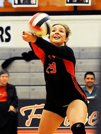 &lt;p&gt;Flathead's Marisa Postovit digs out a ball during the match against Big Sky at Flathead on Saturday. (Aaric Bryan/Daily Inter Lake)&lt;/p&gt;