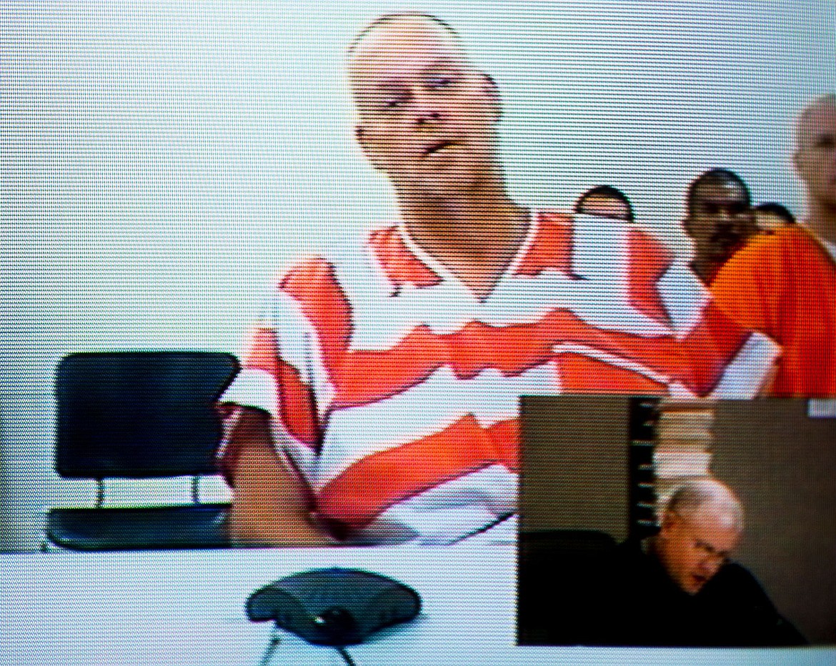 &lt;p&gt;David Earl Hutto, 44, is seen on a television screen during a first appearance with Judge James D. Stow on Monday at the Kootenai County Jail. Hutto is the suspected killer of Bo Kirk.&lt;/p&gt;