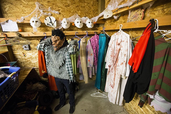 &lt;p&gt;Werewolf actor Chance Johnson tries on a costume top prior to opening night of the Post Falls Haunted House on Oct. 7, 2016.&#160;&lt;/p&gt;