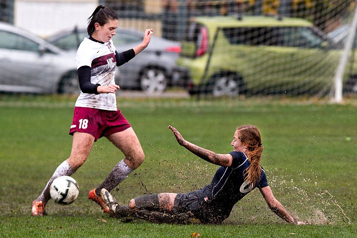 &lt;p&gt;North Idaho's Piper Glover narrowly misses a muddy slide tackle from Erica Simpson of Community Colleges of Spokane on Wednesday, Oct. 26, 2016 at North Idaho College.&lt;/p&gt;